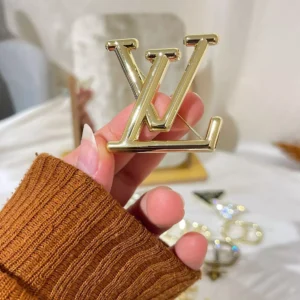 lv brooch