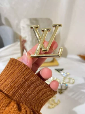lv brooch