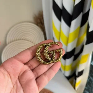 brooch gg