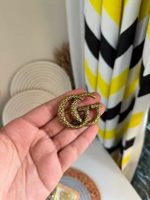 brooch gg