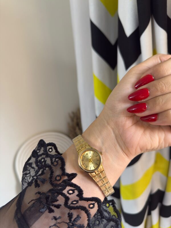 Skone gold watch